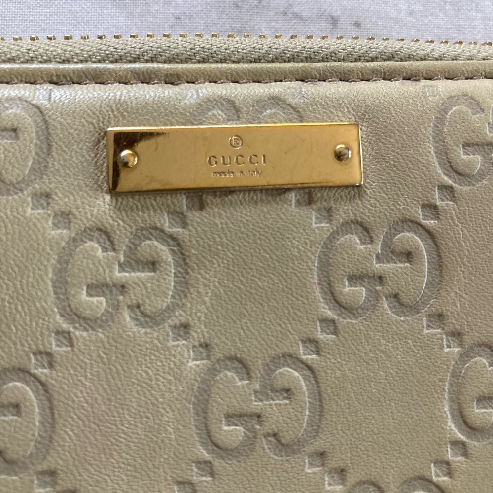 Gucci bone color GG embossed zip around wallet - Picture 6 of 8